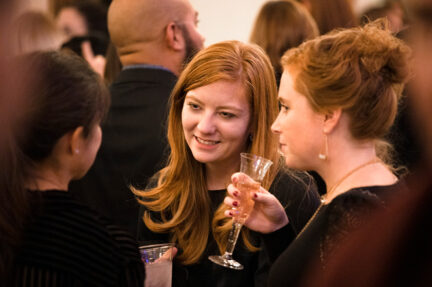Young adults drinking in lobby