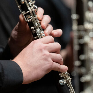 Close up of a clarinet being used by a clarinetist