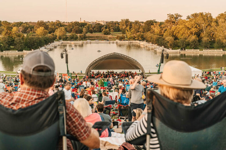 View from perspective of audience members looking down Art Hill at the SLSO bandshell in Forest Park