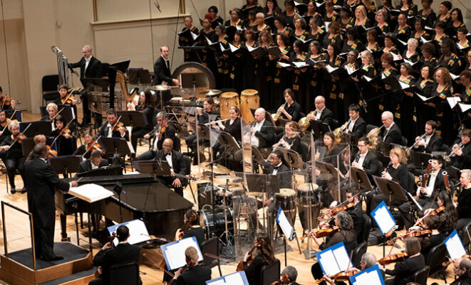 IN UNISON chorus singing on stage with the SLSO as Kevin McBeth conducts