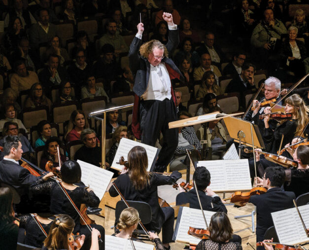 Music Director Stéphane Denève conducting SLSO musicians on stage